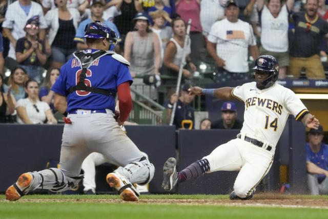 Left fielder Ian Happ saves Cubs with 2 late throws to plate in wild 7-6  win over Brewers in 11 - The San Diego Union-Tribune