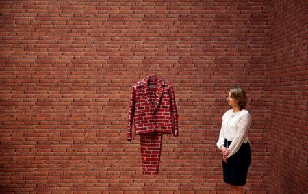 A gallery assistant poses amongst work by Anthea Hamilton from her nominated show "Lichen! Libido!(London!) Chastity!" at a preview of the Turner Prize in London, Britain September 26, 2016. REUTERS/Neil Hall