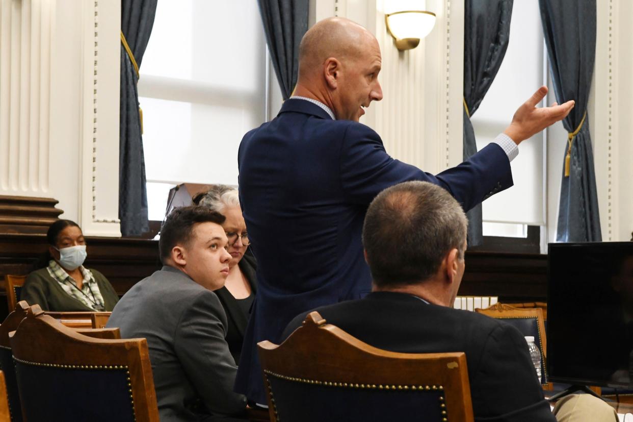 Corey Chirafisi, one of Kyle Rittenhouse's attorneys, center, argues how an image in a video could be construed differently than what may have really happened while arguing what charges should be given to the jury during proceedings on Friday.