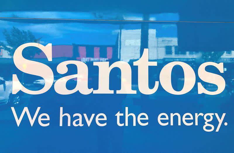 FILE PHOTO: A sign for Santos Ltd is displayed on the front of the company's office building in the rural township of Gunnedah, located in north-western New South Wales