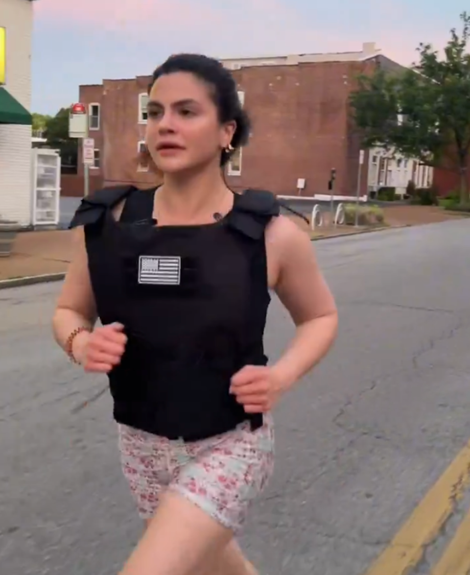Valentina Gomez pictured running in a bulletproof vest in a campaign video posted 12 May. The Missouri Secretary of State candidate is facing online backlash after making an anti-LGBTQ+ statement in the video (Valentina Gomez)