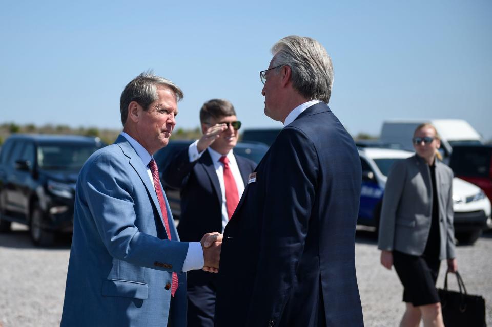 Georgia Gov. Brian Kemp (left) shakes hands with Roland Harings, the CEO of Aurubis AG, during the Aurubis Richmond groundbreaking Friday at Augusta Corporate Park.