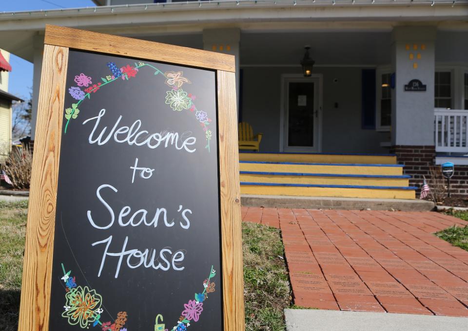 A sign welcomes visitors to Sean's House located on 136 W. Main St. in Newark.