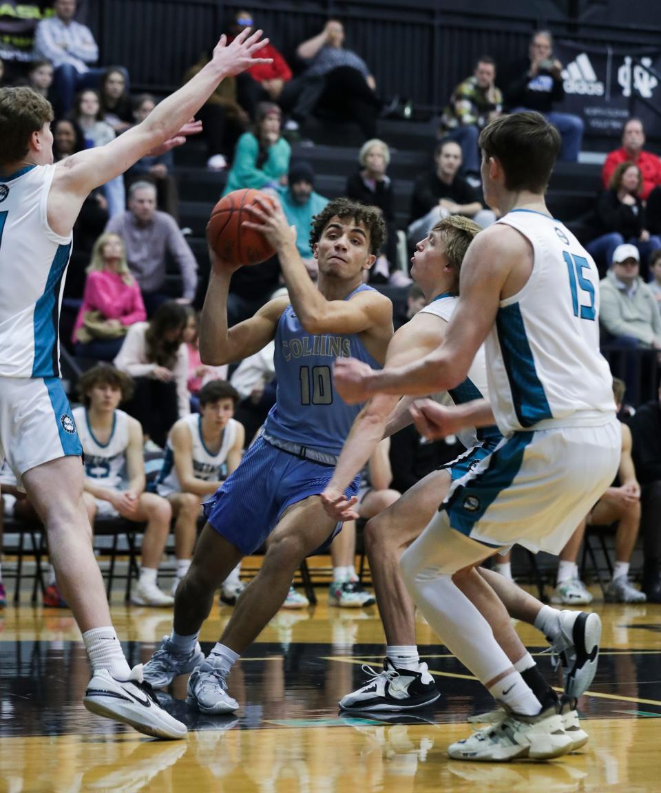 Collin's Kenyon Goodin (10) tries to maneuver through the North Oldham defense during its game at North Oldham High School in Goshen, Ky. on Feb. 14, 2023.