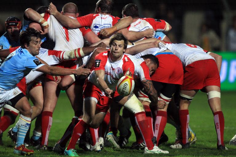 Biarritz's scrum-half Yann Lesgourgues passes the ball during a French Top 14 rugby union match against Perpignan, at the Aime-Giral stadium in Perpignan, on March 22, 2014