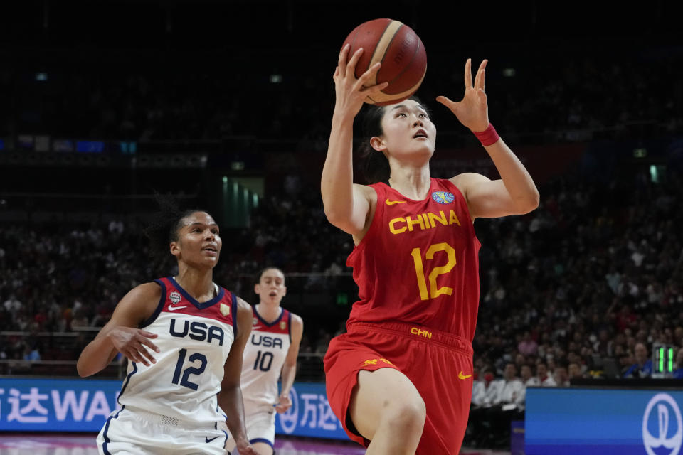 China's Pan Zhenqi lays up to score a goal during their game at the women's Basketball World Cup against the United States in Sydney, Australia, Saturday, Sept. 24, 2022. (AP Photo/Mark Baker)