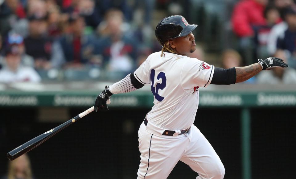 Guardians third baseman Jose Ramirez follows through on a fly out in the first inning of Friday night's home opener against the San Francisco Giants. [Jeff Lange/Beacon Journal]