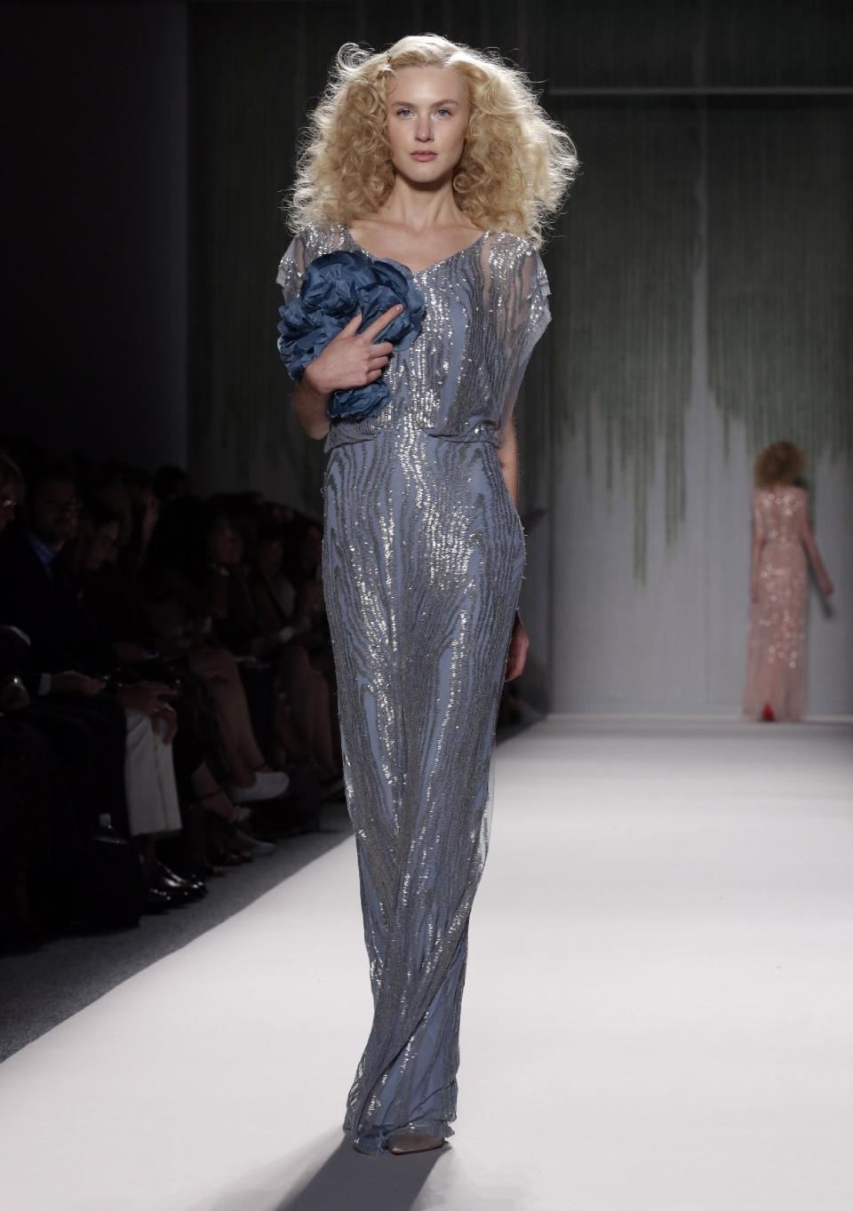 The Jenny Packham Spring 2014 collection is modeled during Fashion Week in New York, Tuesday, Sept. 10, 2013. (AP Photo/Richard Drew)