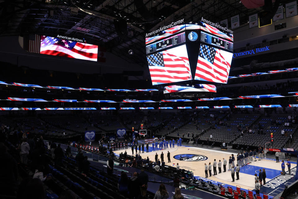 The national anthem is played before a game between the New Orleans Pelicans and the Dallas Mavericks in the first quarter at American Airlines Center on February 12, 2021 in Dallas, Texas. NOTE TO USER: User expressly acknowledges and agrees that, by downloading and/or using this Photograph, User is consenting to the terms and conditions of the Getty Images License Agreement.  (Photo by Ronald Martinez/Getty Images)