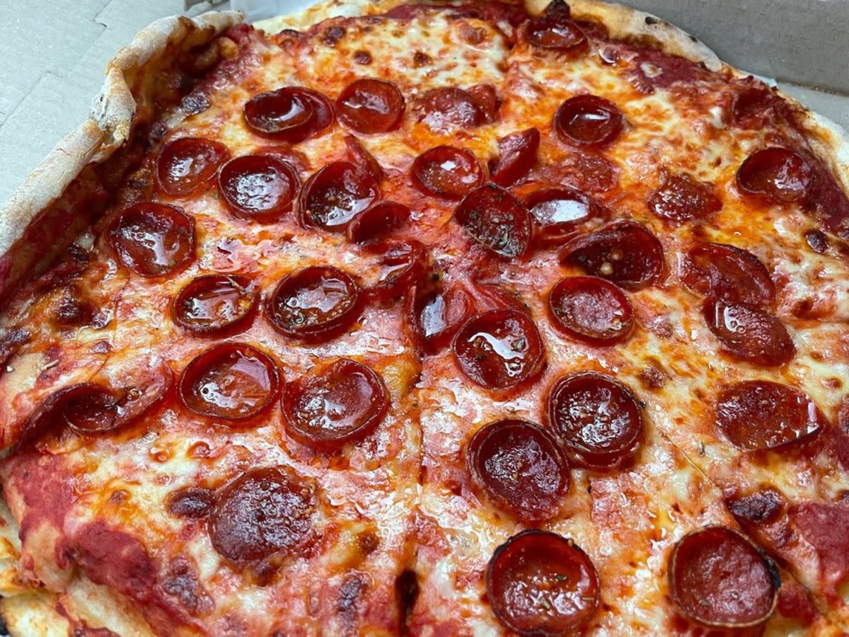 Closeup of pepperoni pizza, Conte’s, Princeton, New Jersey, in a pizza box