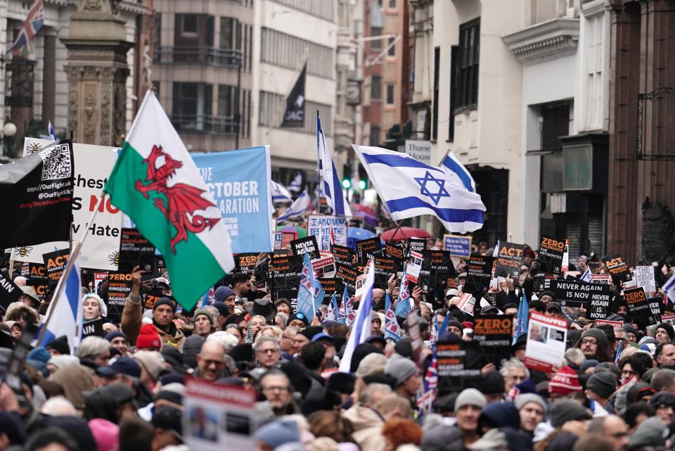 People take part in a march against antisemitism organised by the volunteer-led charity Campaign Against Antisemitism at the Royal Courts of Justice in London (Jordan Pettitt/PA Wire)
