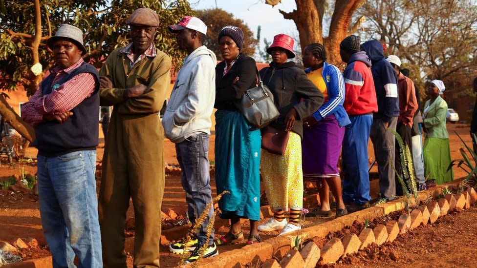 People wait to cast their vote during the Zimbabwe general elections in Kwekwe, outside Harare, Zimbabwe August 23, 2023