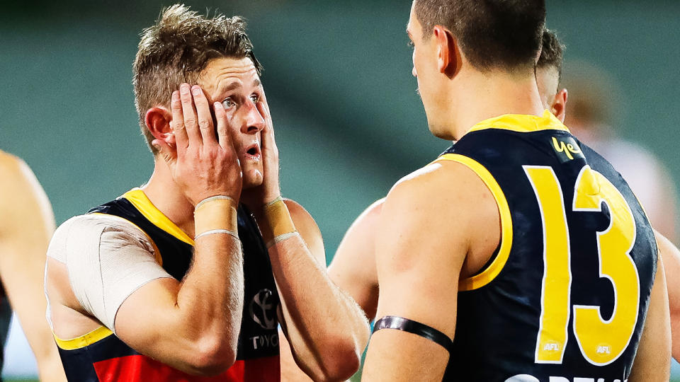 Matt Crouch, pictured here looking dejected during the Adelaide Crows' loss to Port Adelaide.