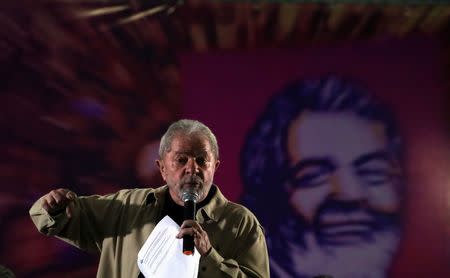 Former Brazilian President Luiz Inacio Lula da Silva gestures as he attends a meeting with women activists in Santo Andre, Brazil, August 15, 2016. REUTERS/Paulo Whitaker