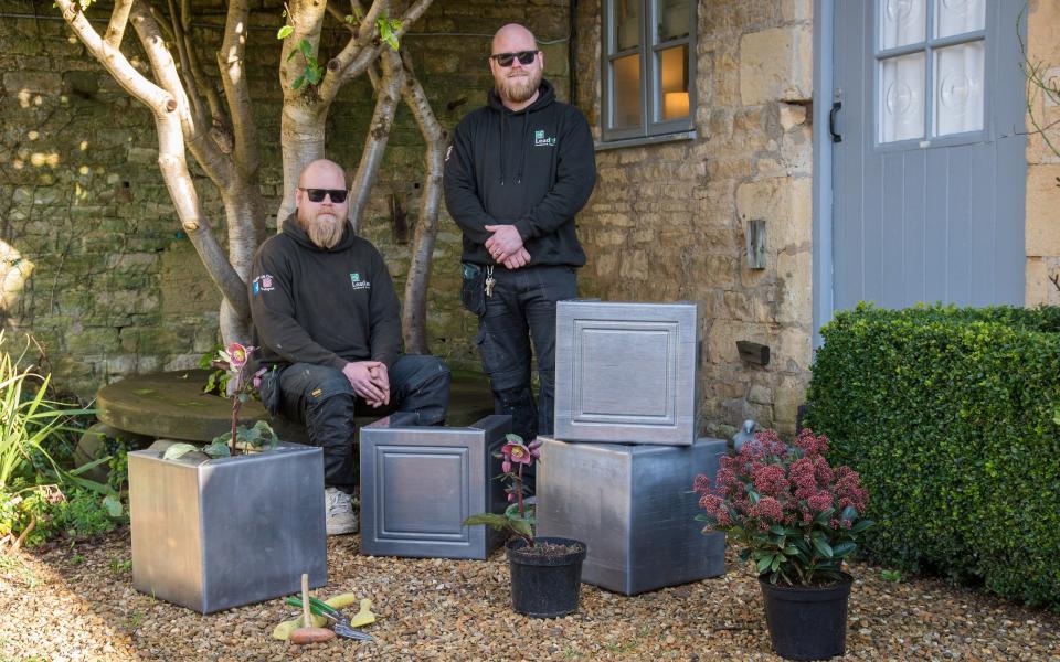 Use plant pots to direct guests to the front door, like these ones developed by David and Luke Hoskins of Lead It Be