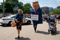 <p>Demonstrators gather outside the White House a day after President Donald Trump fired FBI Director James Comey, Wednesday, May 10, 2017, in Washington. (AP Photo/Evan Vucci) </p>