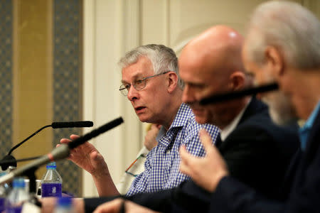 Nobel laureate Richard Roberts (L) speaks at a news conference in Beijing, China, May 7, 2016. REUTERS/Jason Lee