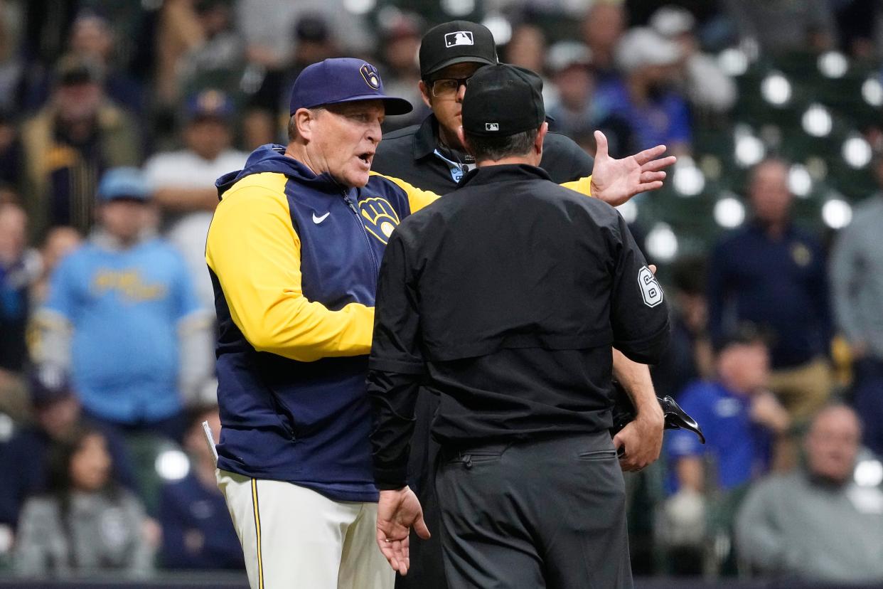 Brewers manager Pat Murphy argues a call with umpire crew chief Chris Guccione and home plate umpire Ryan Additon during the ninth inning against the Tampa Bay Rays at American Family Field.