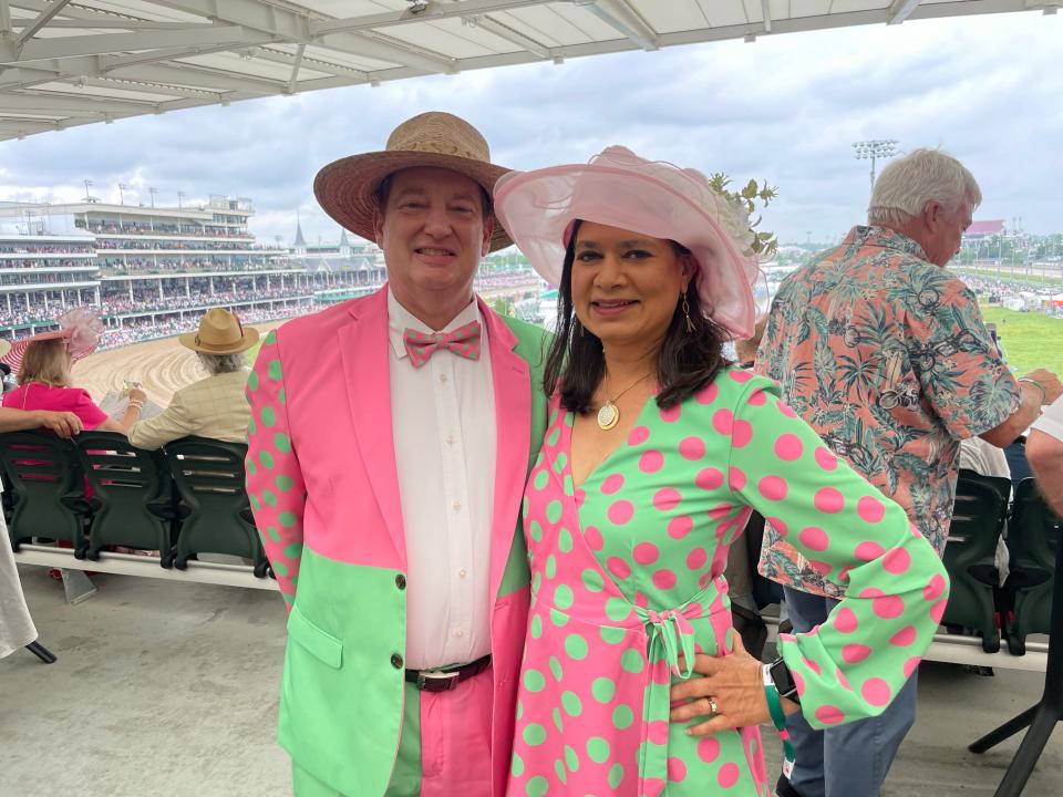 John and Anjali Markey came prepared in matching green and pink polka dotted outfits on Kentucky Oaks Day.