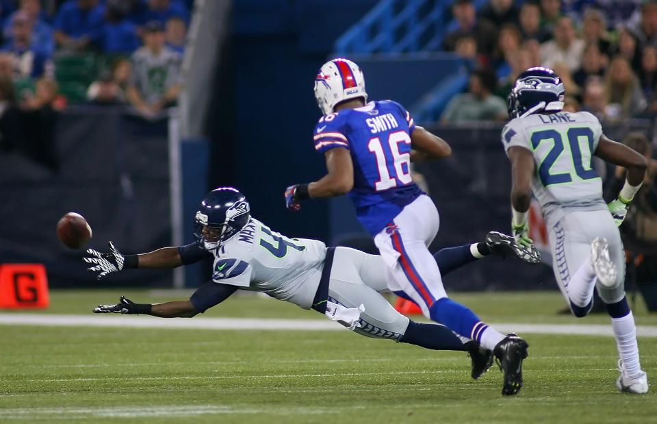 TORONTO, ON - DECEMBER 16: Byron Maxwell #41 of the Seattle Seahawks can't reach a pass for an interception against the Buffalo Bills at Rogers Centre on December 16, 2012 in Toronto, Ontario, Canada. Seattle won 50-17. (Photo by Rick Stewart/Getty Images)