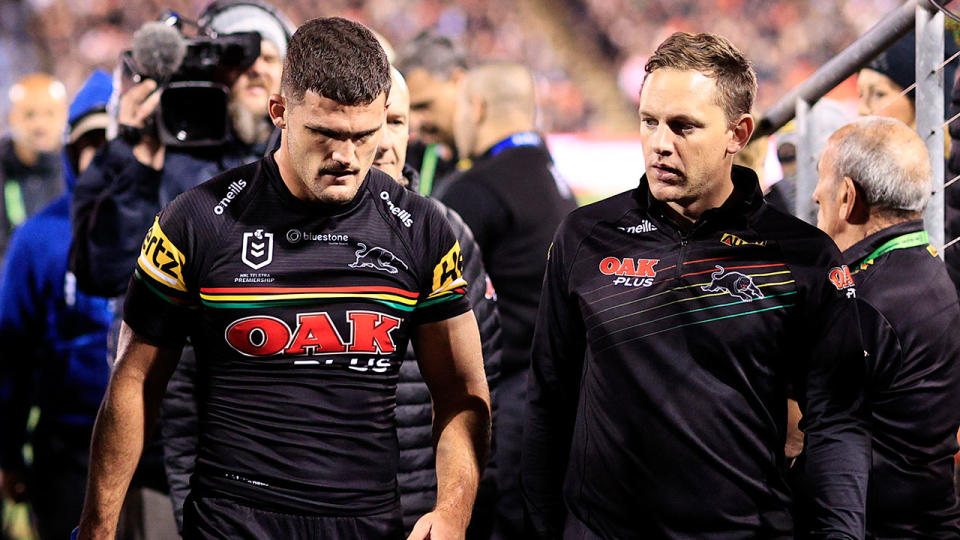 Pictured here, Nathan Cleary leaving the field after suffering a hamstring injury in Penrith's NRL victory over the Dragons.