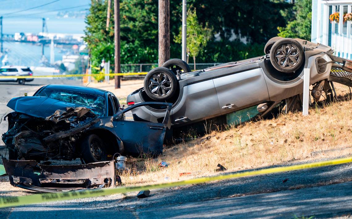 A woman was killed after the driver of a stolen Kia Sportage ran the stop sign and crashed into a Dodge Avenger at East 34th Street and East D Street in Tacoma on Sept. 1, 2022.