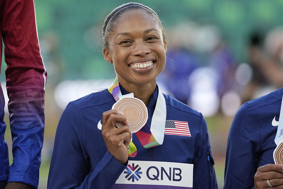 Allyson Felix, of the United States holds her bronz medal at the World Athletics Championships Friday, July 15, 2022, in Eugene, Ore. (AP Photo/David J. Phillip)