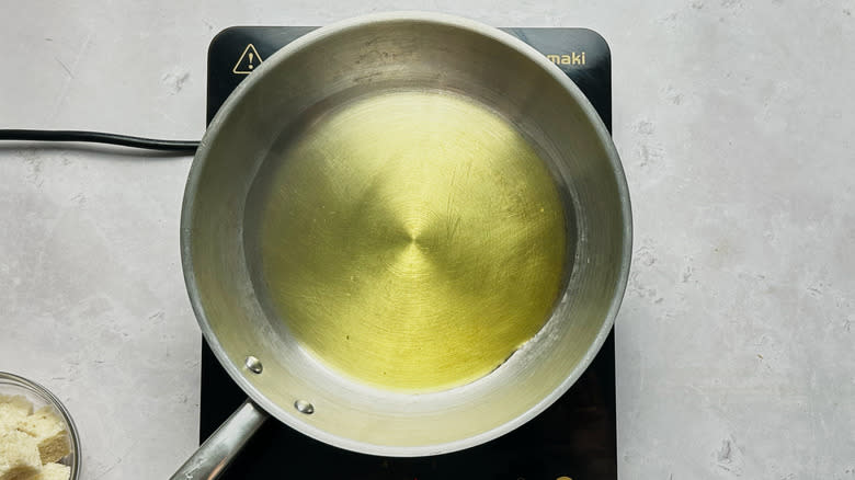 heating oil in a skillet