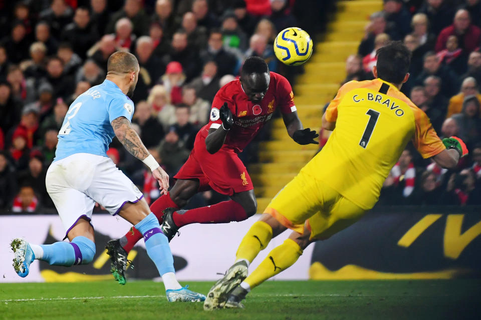 LIVERPOOL, ENGLAND - NOVEMBER 10: Sadio Mane of Liverpool scores his team's third goal during the Premier League match between Liverpool FC and Manchester City at Anfield on November 10, 2019 in Liverpool, United Kingdom. (Photo by Laurence Griffiths/Getty Images)