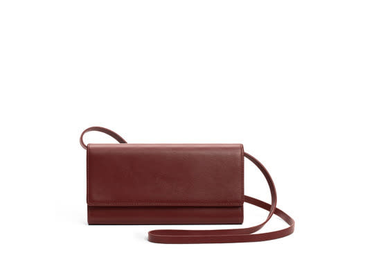 <p>Want Les Essentiels Bradshaw Continental Wallet, $276.50, <a href="http://www.wantlesessentiels.com/us_en/bradshaw?color=355" rel="nofollow noopener" target="_blank" data-ylk="slk:wantlesessentiels.com;elm:context_link;itc:0;sec:content-canvas" class="link ">wantlesessentiels.com</a></p>