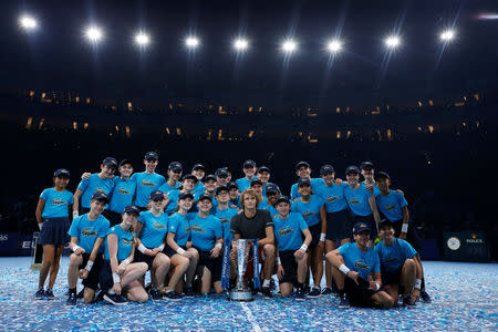 Tennis - ATP Finals - The O2, London, Britain - November 18, 2018 Germany's Alexander Zverev poses for a photograph with the trophy after winning the final against Serbia's Novak Djokovic Action Images via Reuters/Andrew Couldridge