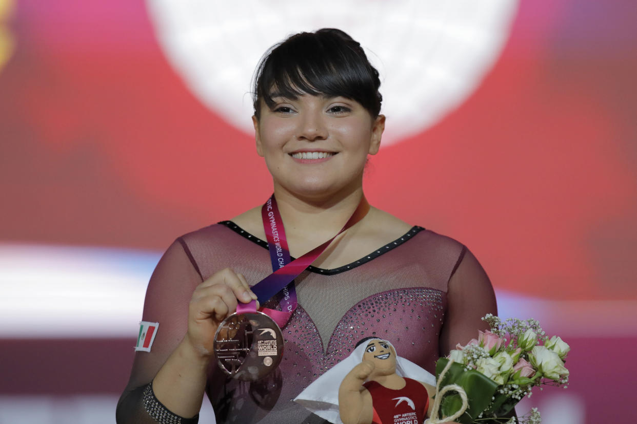 Mexico's Alexa Moreno shows her bronze medal after the women's vault final on the first day of the apparatus finals of the of the Gymnastics World Chamionships at the Aspire Dome in Doha, Qatar, Friday, Nov. 2, 2018. (AP Photo/Vadim Ghirda)