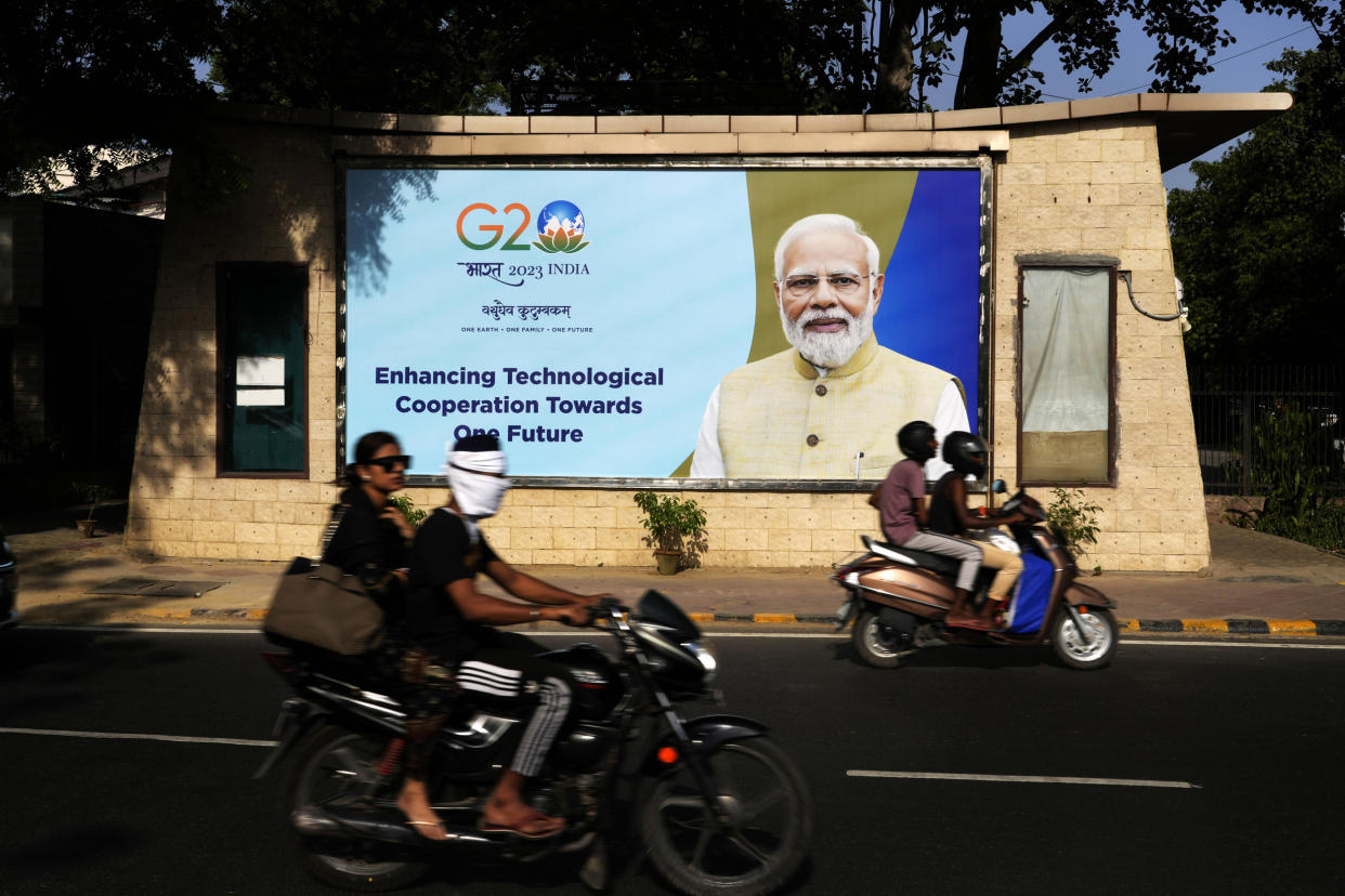 Image:The Indian government has seized upon its role as host of this year's G20 summit and mounted an advertising blitz that stresses India's growing clout under Prime Minister Narendra Modi.  (Manish Swarup / AP)