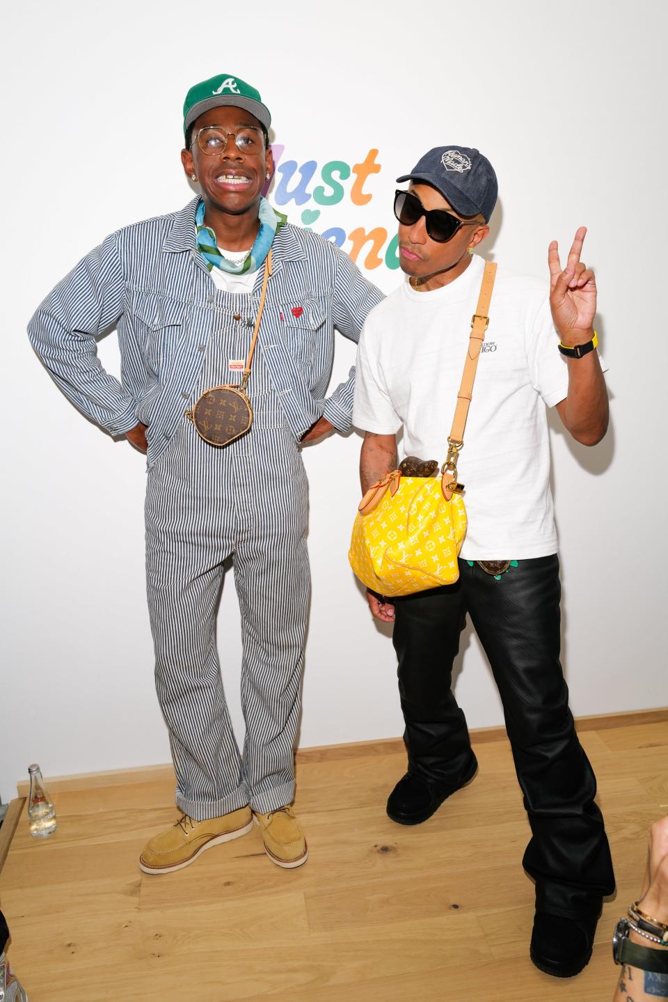 <h1 class="title">JOOPITER, Pharrell Williams & Sarah Andelman Celebrate the Opening of “Just Phriends”</h1><cite class="credit">Photo by Sansho Scott / BFA</cite>