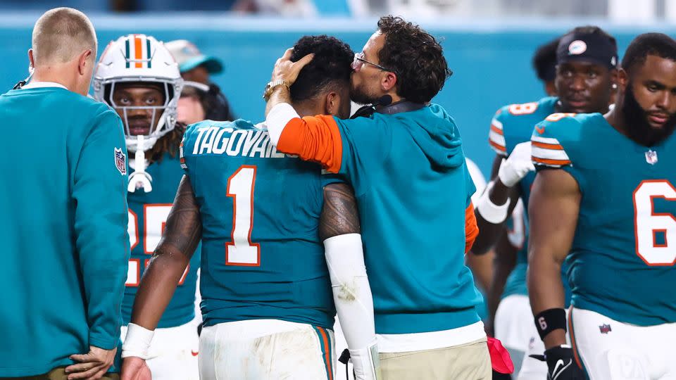 McDaniel comforts Tagovailoa after the quarterback's latest concussion. - Megan Briggs/Getty Images