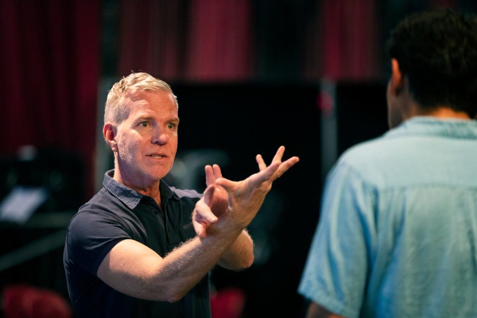 Director Mark Christopher rehearses with cast members for the debut of his play, 'Mid-Century Moderns,' at the Desert Rose Playhouse in Palm Springs, Calif., on April 5, 2022. 