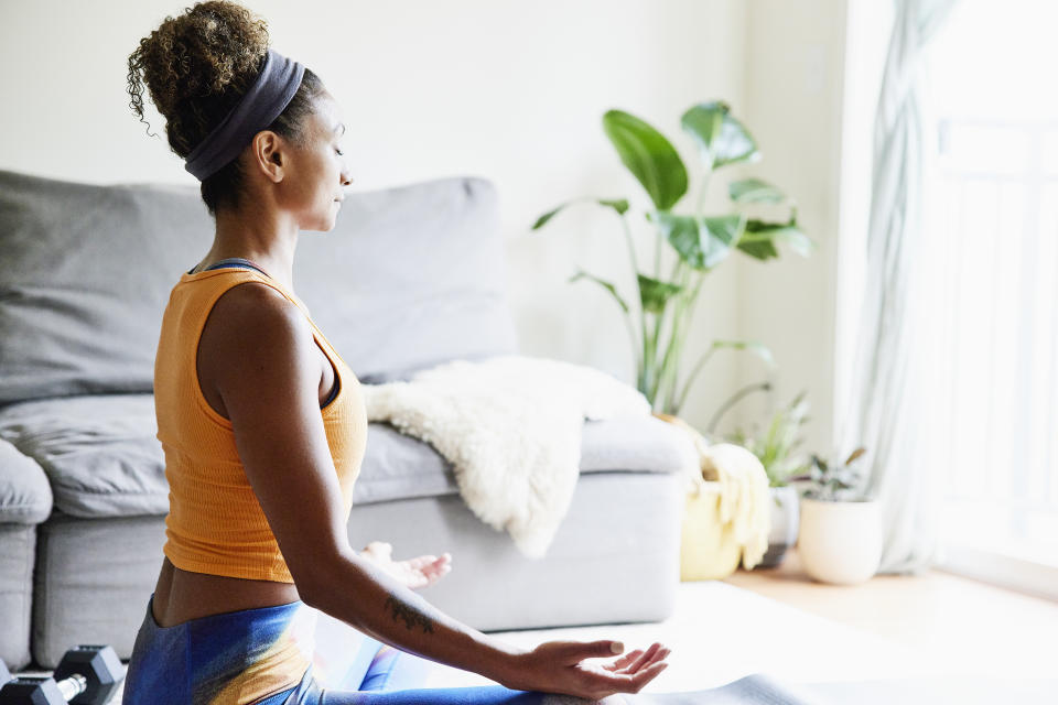 Woman practising yoga. Source: Getty Images