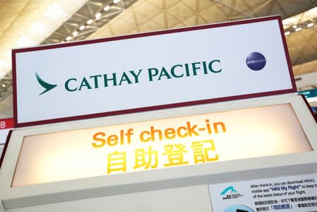 FILE PHOTO: A Cathay Pacific self check-in machine is displayed at Hong Kong Airport in Hong Kong