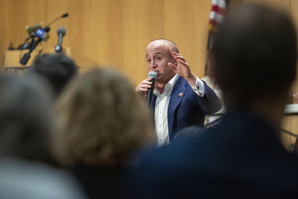 U.S. Rep. Max Rose speaks to constituents during a town hall meeting, Wednesday, Oct. 2, 2019, at the Joan and Alan Bernikow Jewish Community Center in the Staten Island borough of New York. (AP Photo/Mary Altaffer)
