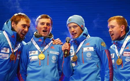 Biathlon - IBU World Championships - Men 4 x 7.5 km Relay - Hochfilzen, Austria - 18/2/17 - Alexey Volkov of Russia, Maxim Tsvetkov of Russia, Anton Babikov of Russia and Anton Shipulin of Russia react. REUTERS/Leonhard Foeger