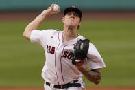 Boston Red Sox starting pitcher Tanner Houck delivers to a New York Yankees batter during the first inning of a baseball game at Fenway Park, Thursday, July 22, 2021, in Boston. (AP Photo/Elise Amendola)