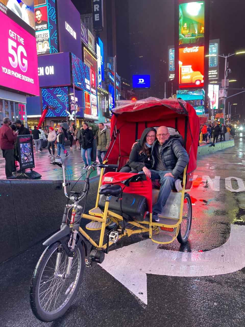 The Saalmans aboard their pedicab.