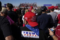 Supporters of President Donald Trump wait for his arrival for a campaign rally Wednesday, Oct. 28, 2020, in Goodyear, Ariz. (AP Photo/Ross D. Franklin)