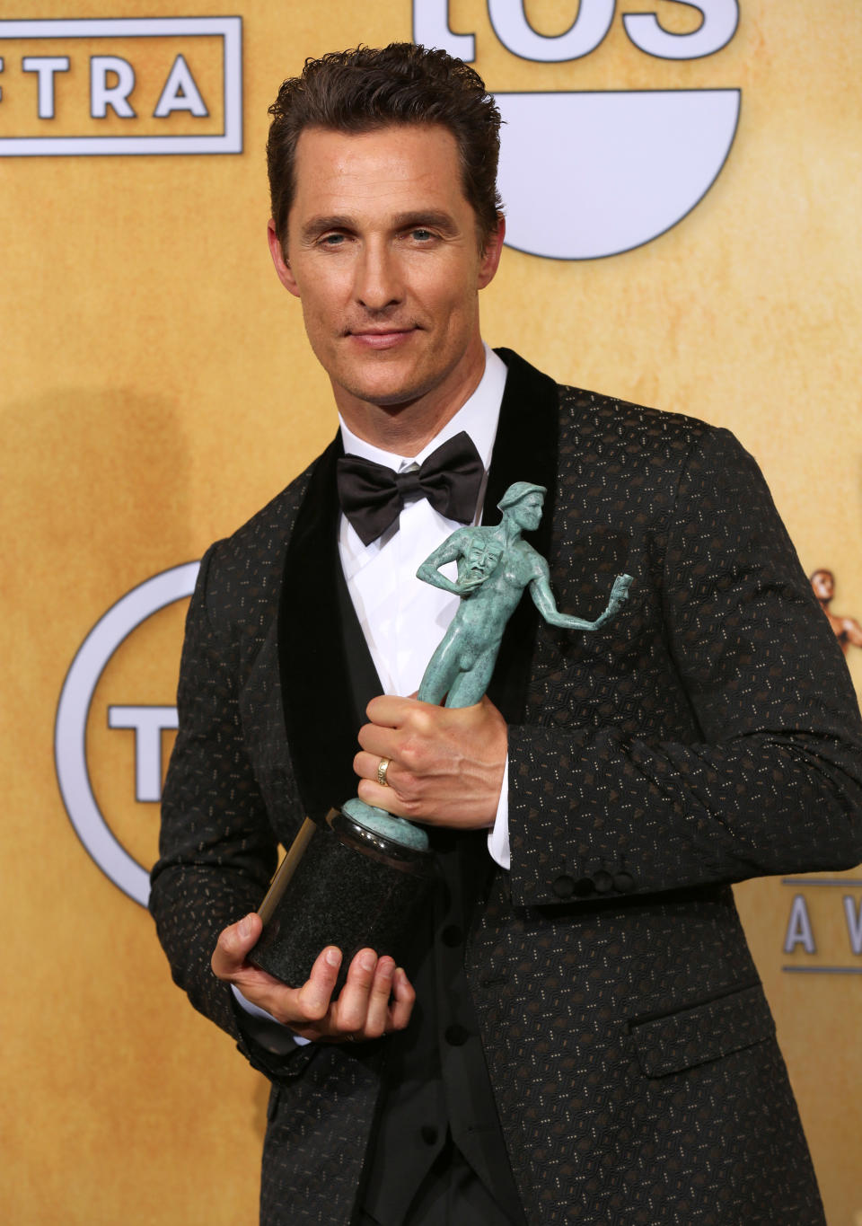 Matthew McConaughey poses in the press room with the award for outstanding performance by a male actor in a leading role for “Dallas Buyers at the 20th annual Screen Actors Guild Awards at the Shrine Auditorium on Saturday, Jan. 18, 2014, in Los Angeles. (Photo by Matt Sayles/Invision/AP)