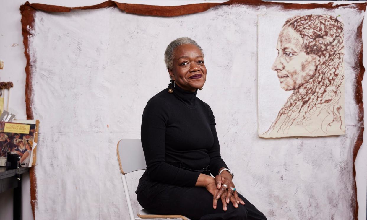 <span>Claudette Johnson’s with her portrait of the African American Sarah Parker Remond, which was part of her New York show Drawn Out.</span><span>Photograph: David Levene/The Guardian</span>