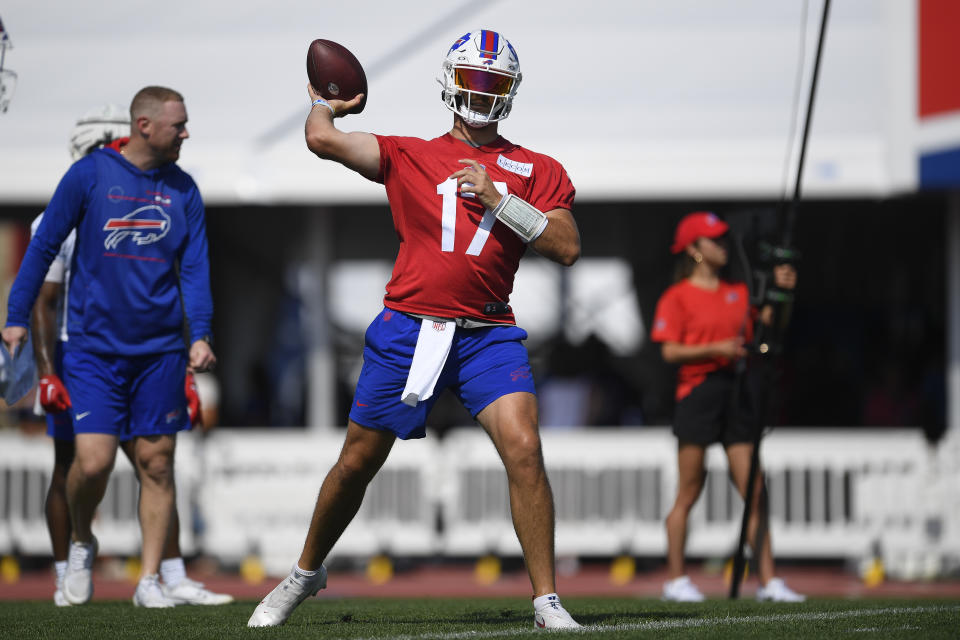 FILE - Buffalo Bills quarterback Josh Allen throws a pass during practice at the NFL football team's training camp in Pittsford, N.Y., Friday, July 28, 2023. (AP Photo/Adrian Kraus, File0 Allen has become accustomed to having his public life picked over and documented with his star status in Buffalo and beyond showing no signs of cresting.