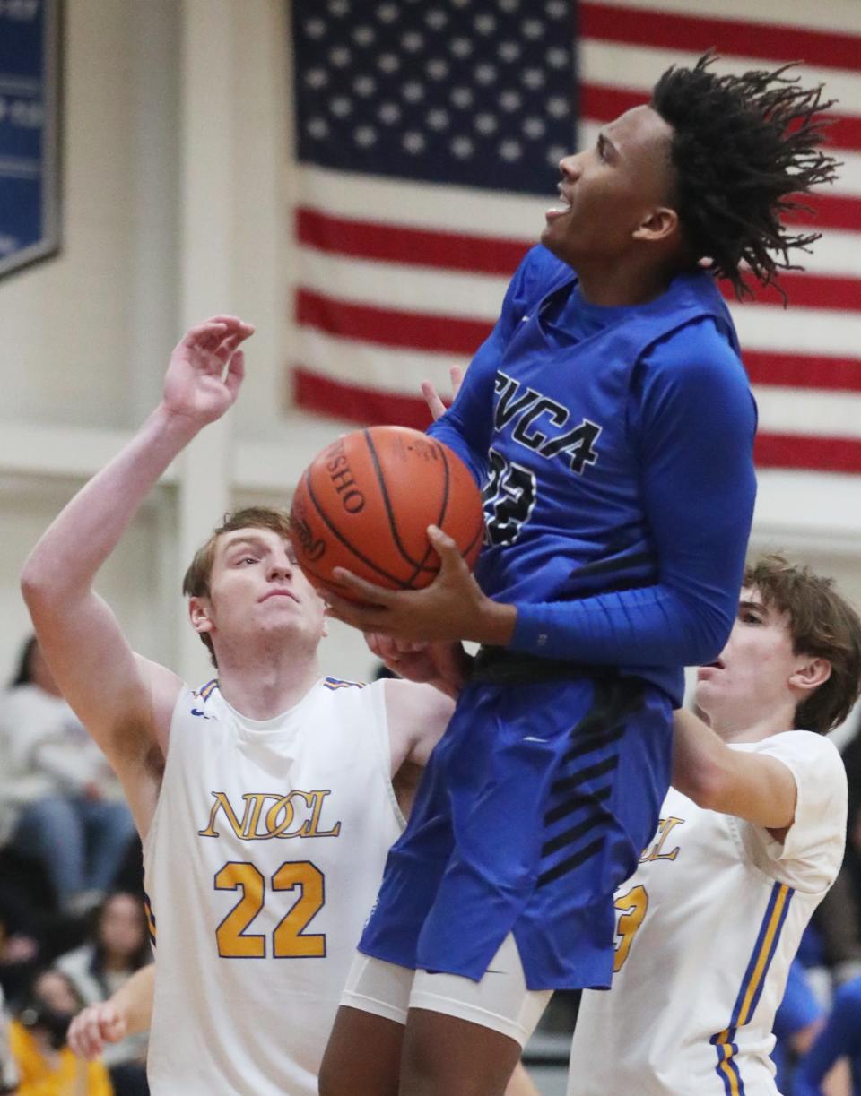 CVCA's Darryn Peterson goes to the basket over ND-CL's Noah Rogers in the first half of the game at CVCA, Tuesday, Dec. 14, 2021.