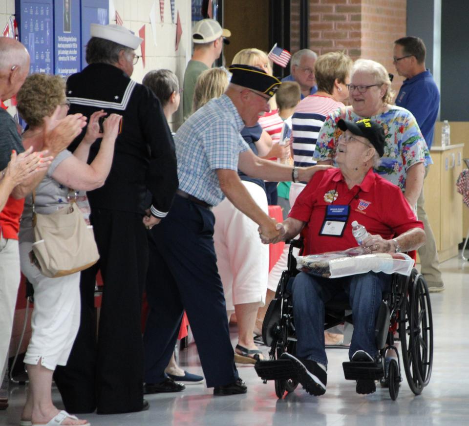 People lined the hallway at Tri-Rivers Career Center in Marion to pay tribute to the veterans who attended the Honor Flight at Home event on Saturday, June 11, 2022. A total of 17 veterans of World War II, Korea, Vietnam, and the Cold War were honored during the ceremony.