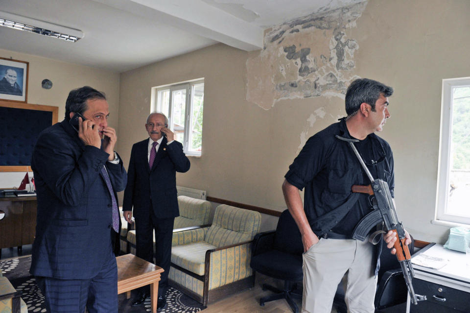 FILE - Kemal Kilicdaroglu, leader of the main opposition Republican People's Party, CHP, center, speaks on his mobile phone in Savsat, Artvin, Turkey, on Thursday, Aug. 25, 2016. The main challenger trying to unseat Turkish President Recep Tayyip Erdogan in the May 14 presidential election cuts a starkly different figure than the incumbent who has led the country for two decades. As the polarizing Erdogan has grown increasingly authoritarian, Kilicdaroglu has a reputation as a bridge builder and vows to restore democracy. (AP Photo, File)