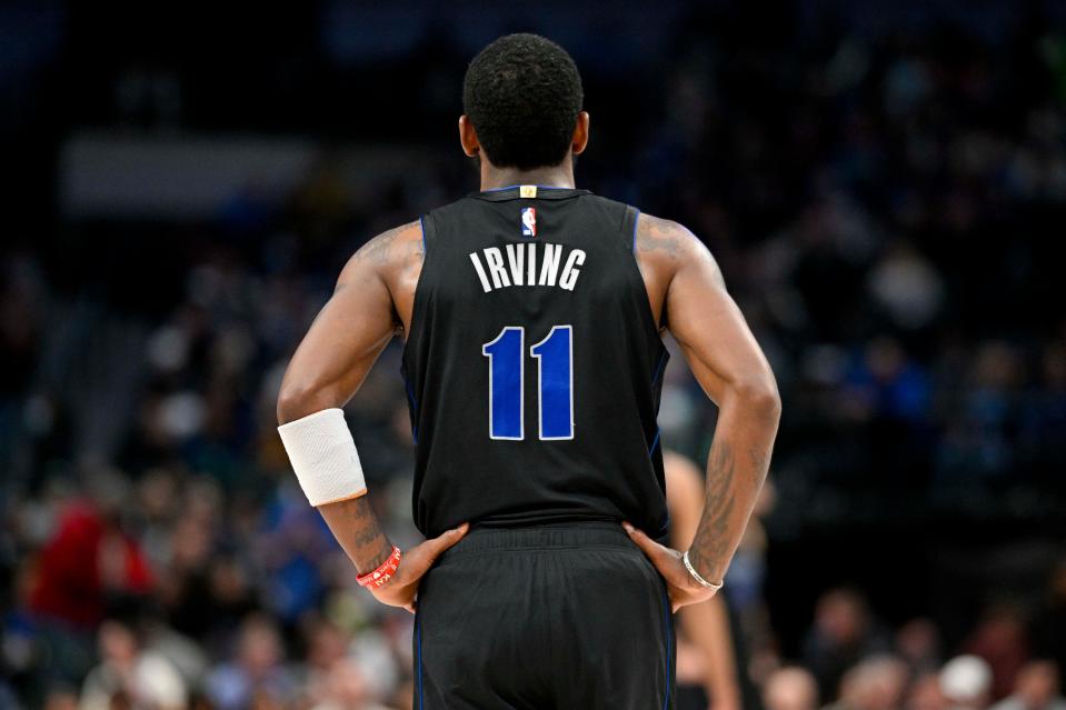 Jan 15, 2024; Dallas, Texas, USA; Dallas Mavericks guard Kyrie Irving (11) waits for play to resume against the New Orleans Pelicans during the second half at the American Airlines Center. Mandatory Credit: Jerome Miron-USA TODAY Sports